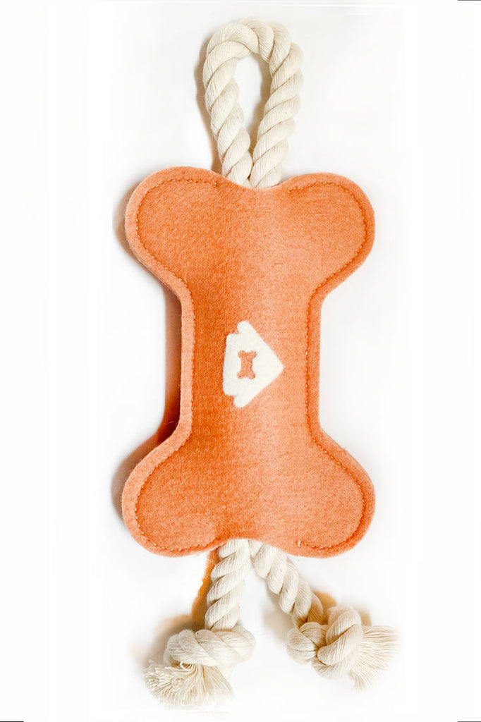 peach colored wool dog toy