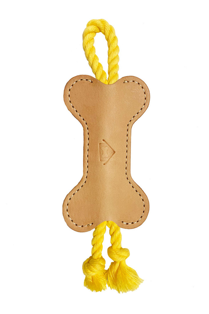 yellow colored vegetable leather tug toy, full view
